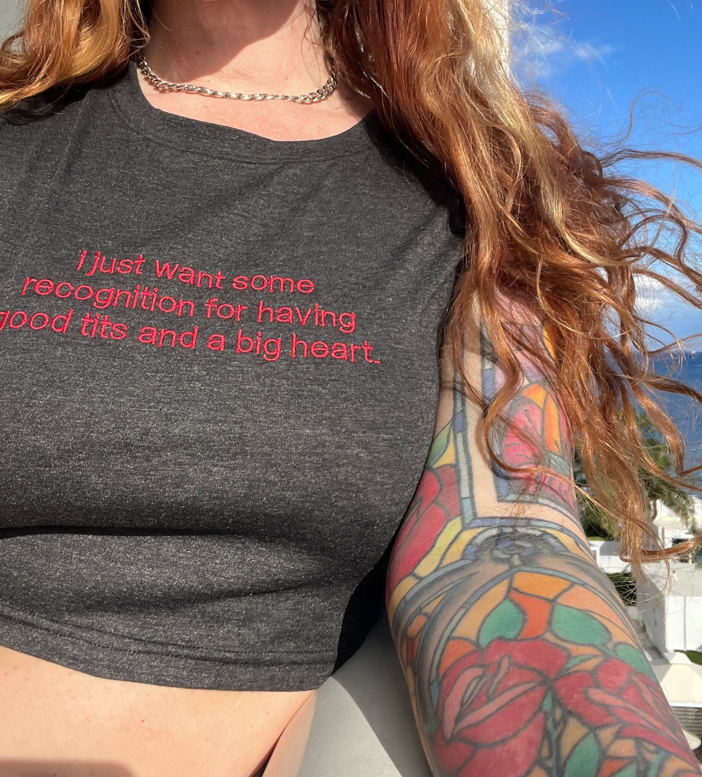 a woman with a tattoo on her arm