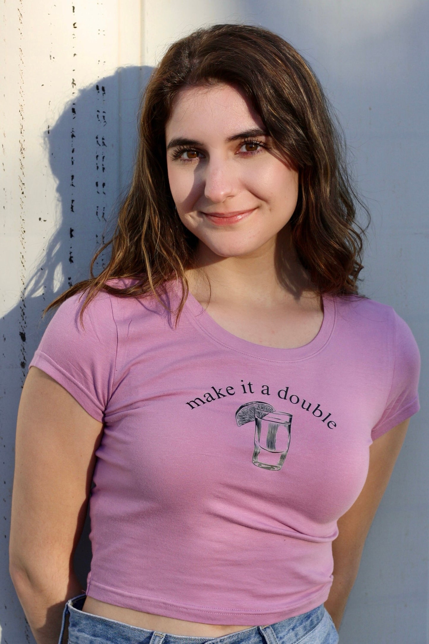 a pink t - shirt with the words make it a double on it