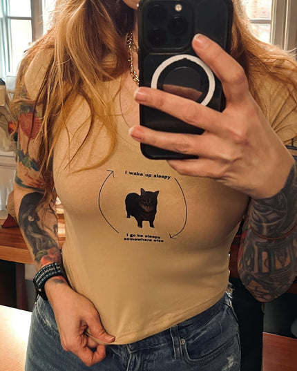 a woman taking a selfie with her cell phone