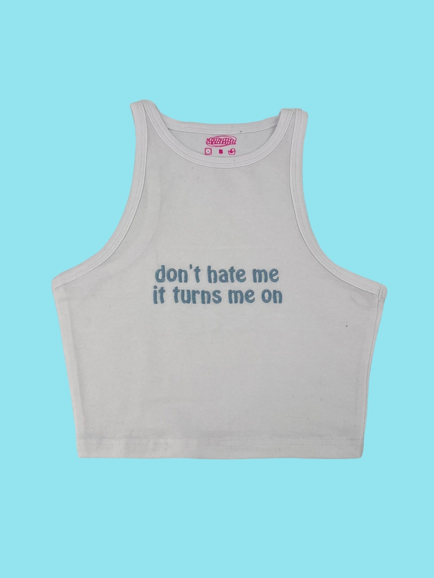 a white crop top that says, don't hate me if turns me on