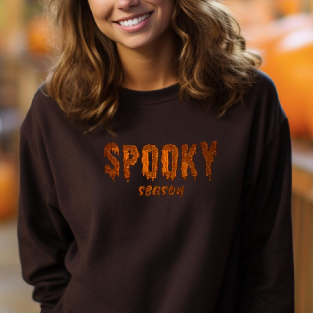 a woman wearing a spooky brown shirt