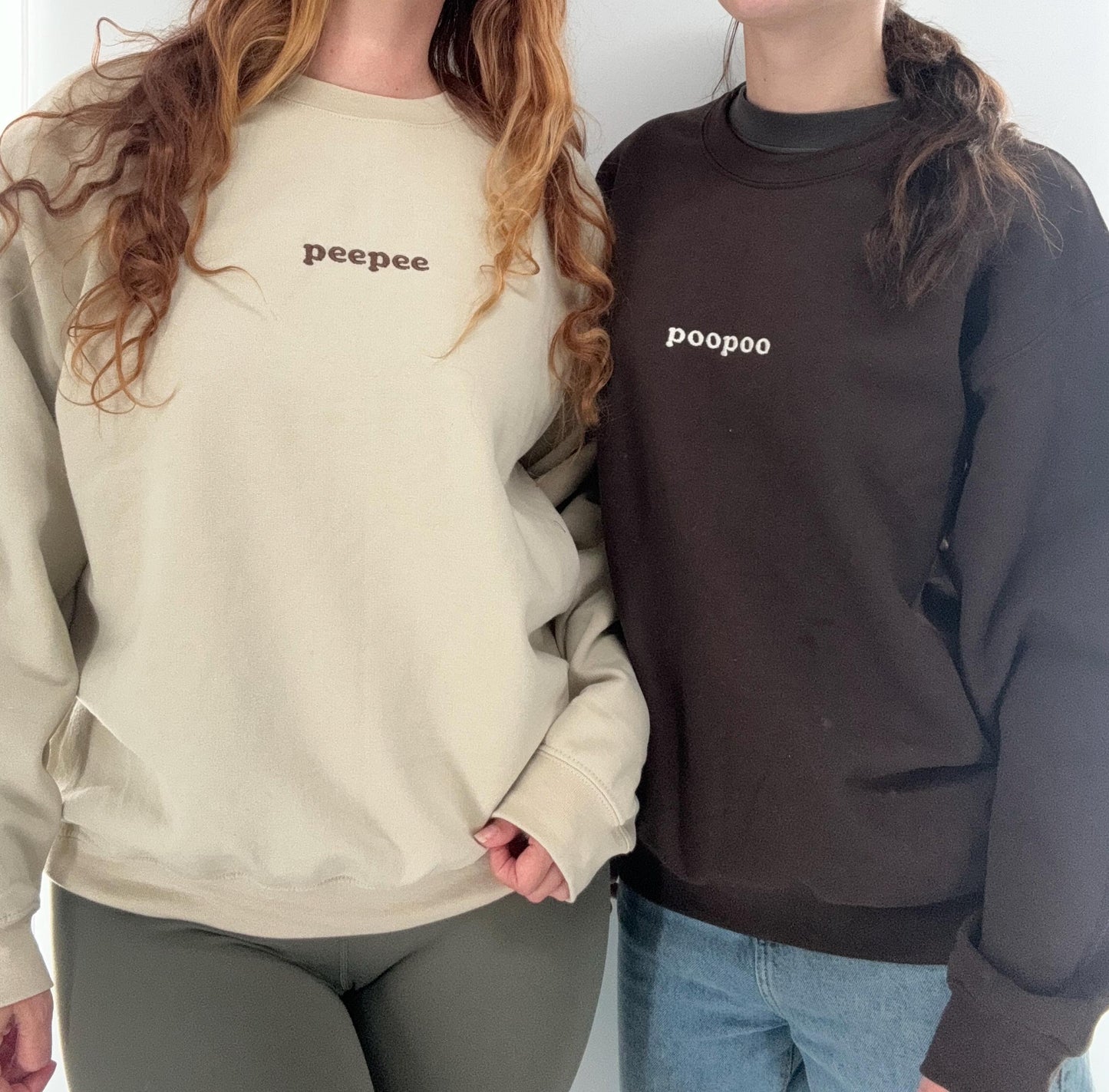 a couple of women standing next to each other