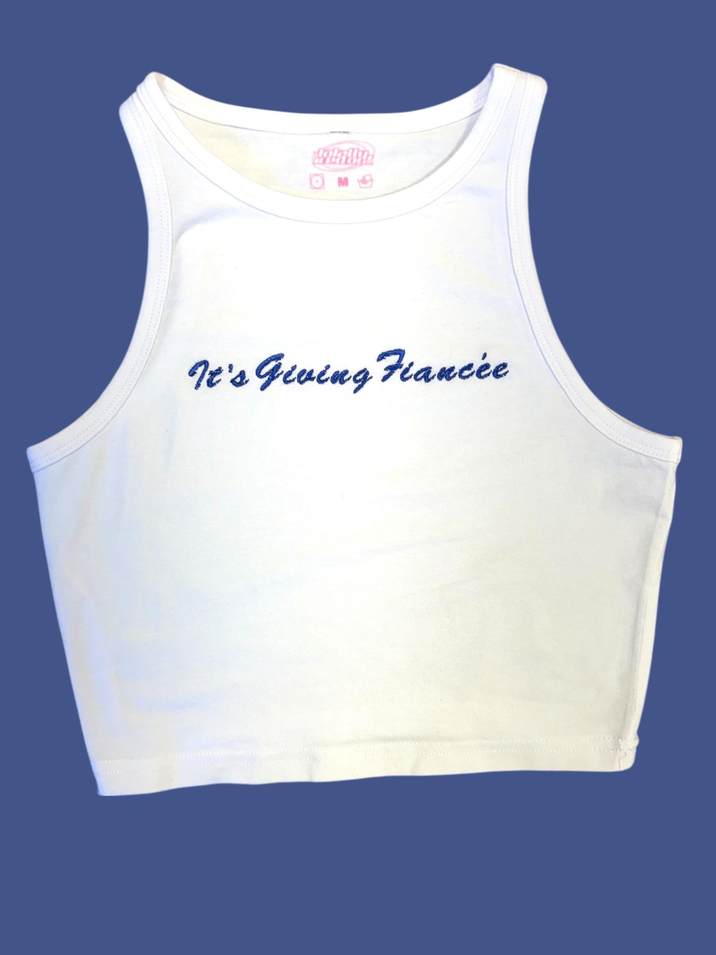 a white crop top that says it's young france