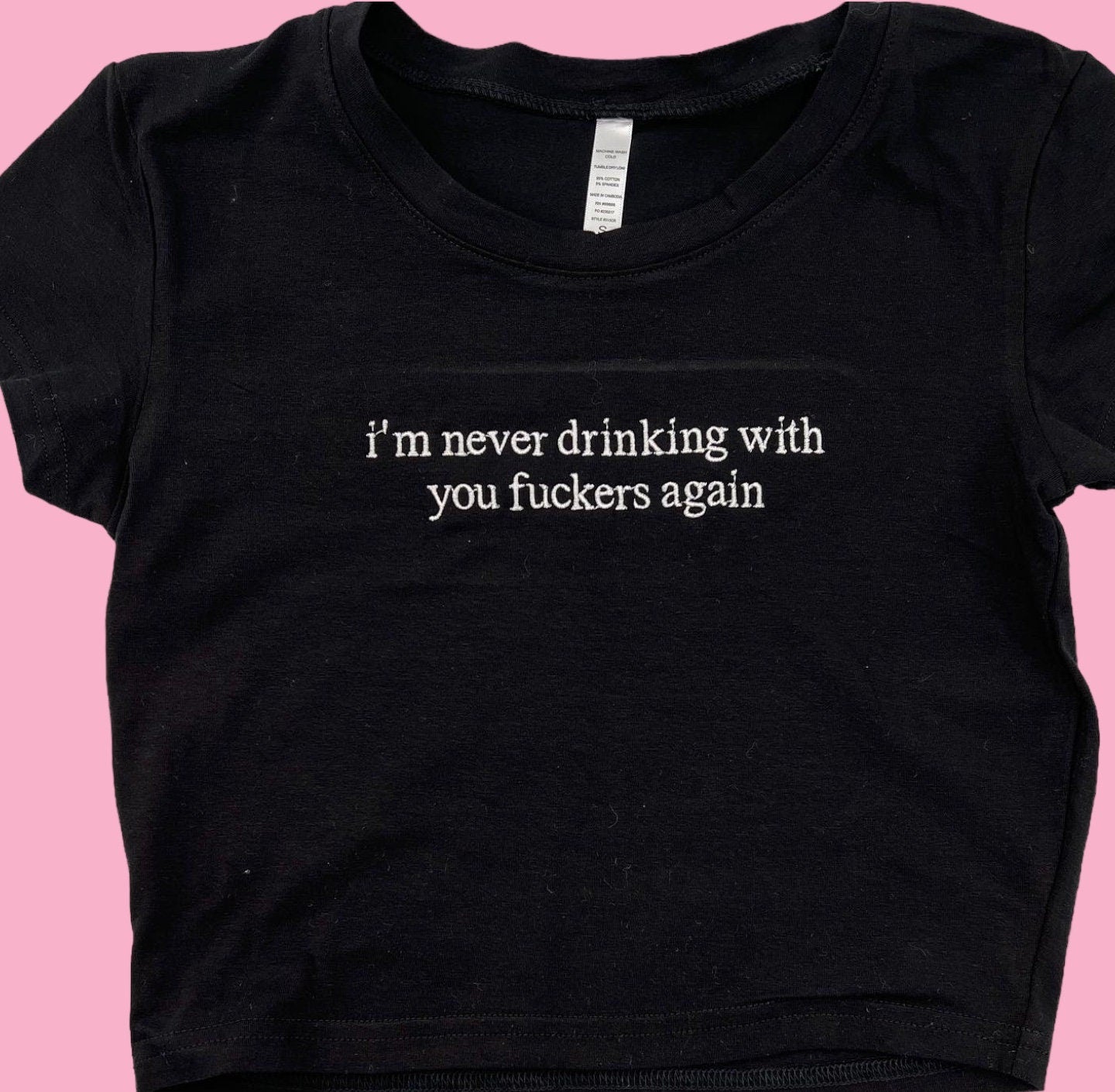 a black t - shirt with the words, i'm never drinking with you