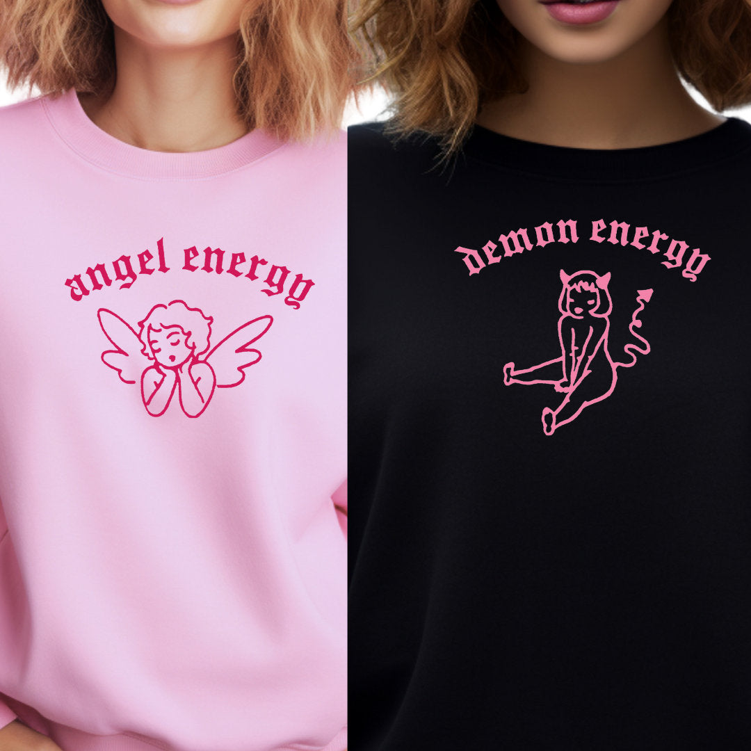 two models wearing matching sweatshirts with the same slogan