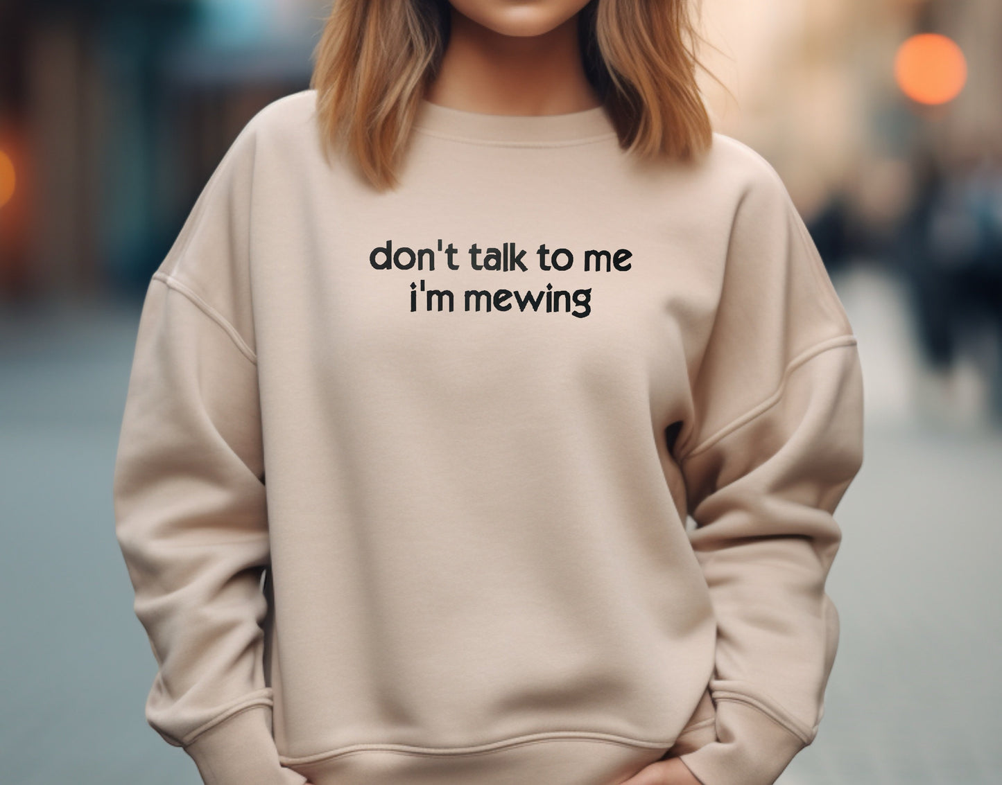 a woman wearing a sweatshirt that says don't talk to me i'm
