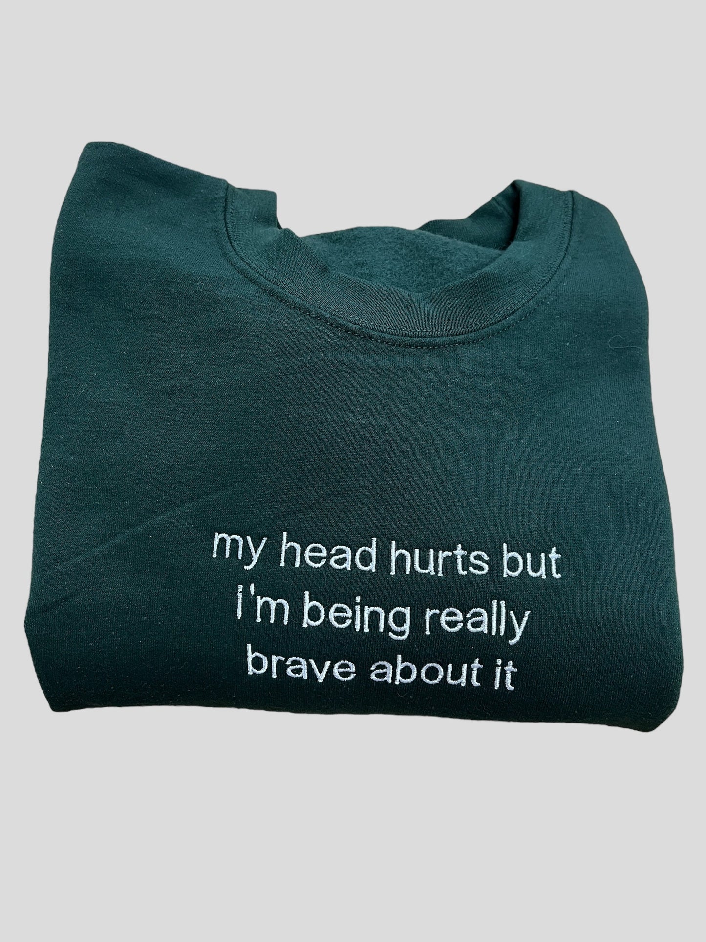 a t - shirt that says, my head hurts but i'm being really