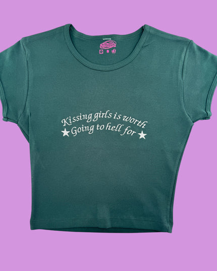 a green t - shirt with white writing on it