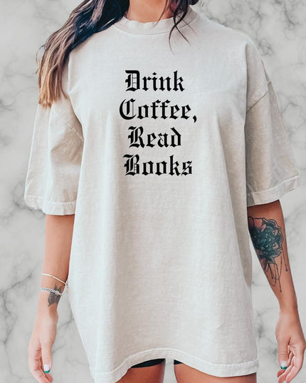 a woman wearing a white shirt that says drink caffe, read books