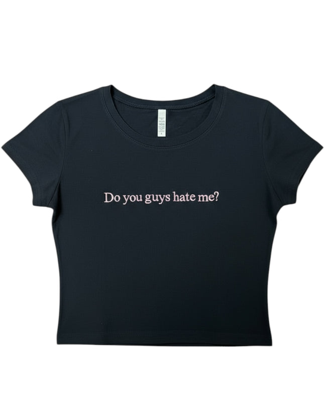 A black t-shirt with the text "Do you guys hate me?" printed on it.