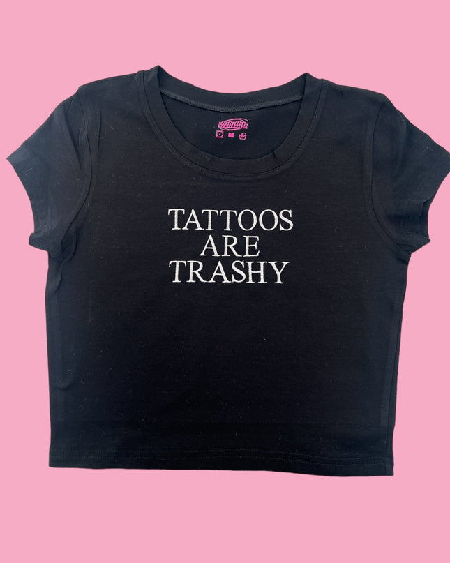 a black shirt that says tattoos are trashy