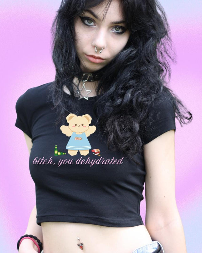 a woman with a teddy bear on her shirt