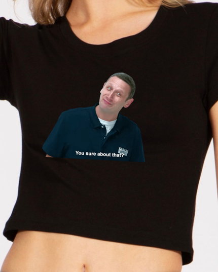 A person wearing a black shirt with a graphic of a man's face and the text "You sure about that?" printed on it.