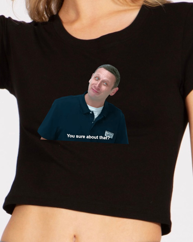 A person wearing a black shirt with a graphic of a man's face and the text "You sure about that?" printed on it.