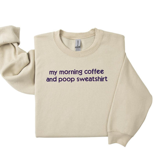 a sweater with the words'my morning coffee and poop sweatshirt '