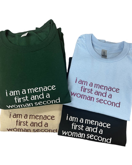 three t - shirts that say i am a menage first and a woman second