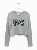 A gray long-sleeved shirt with a graphic design featuring three cats.