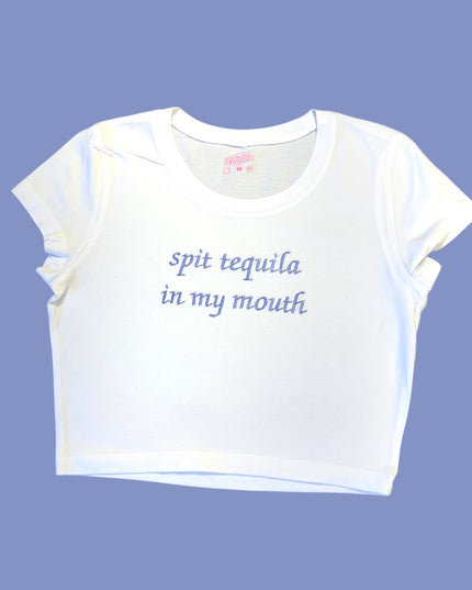 a white t - shirt that says, spit tequila in my mouth