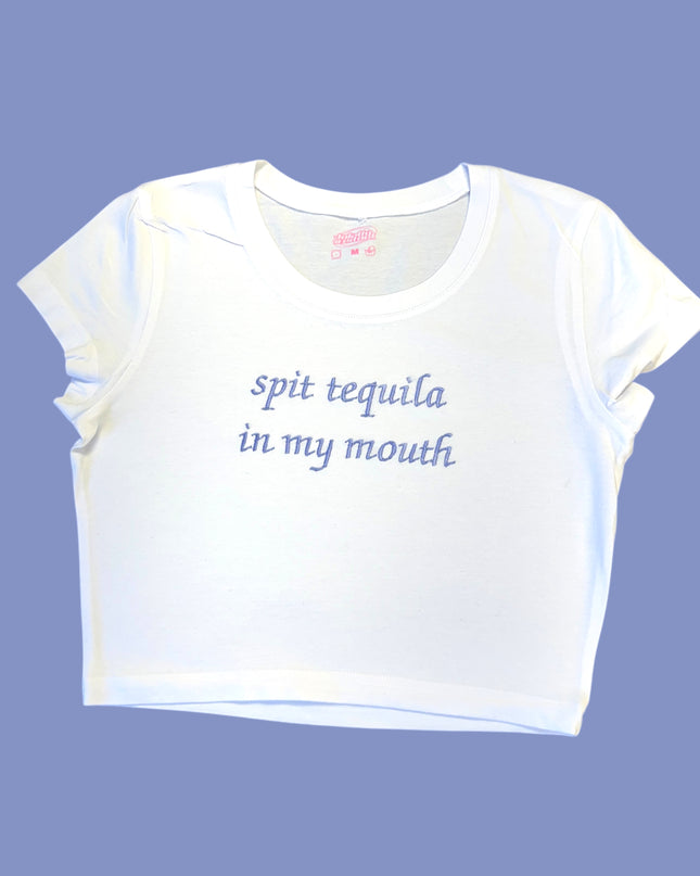 a white t - shirt that says, spit tequila in my mouth