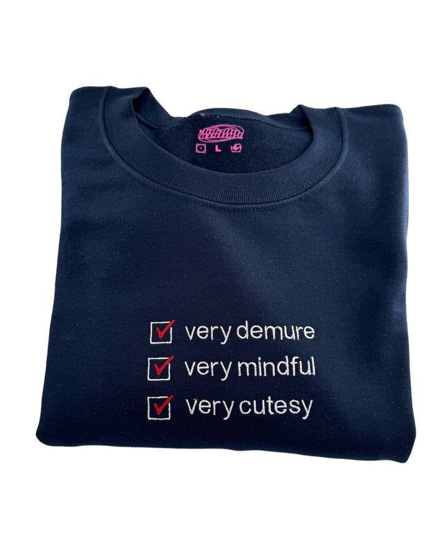 a blue t - shirt with a check mark on it