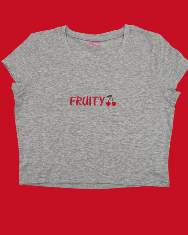 a grey crop top with fruit on it