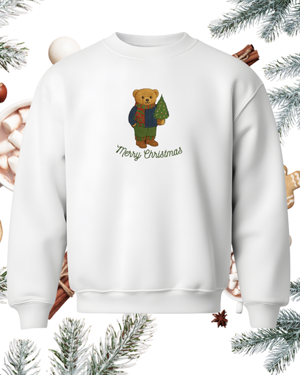 A white sweater with a graphic of a teddy bear holding a Christmas tree and the text "Merry Christmas" printed on it.