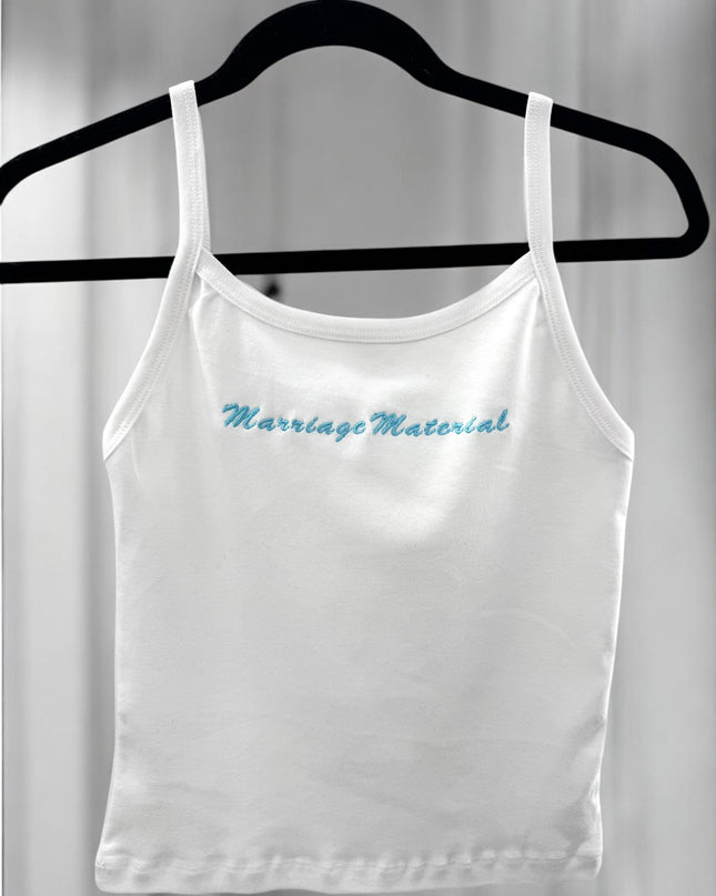a white crop top with a blue message on it