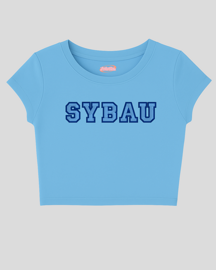 A light blue cropped t-shirt with the word "SYBAU" printed in large blue letters across the front.