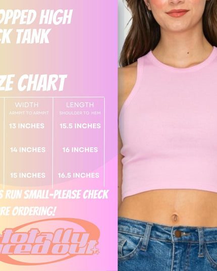 a woman wearing a pink crop top and jeans