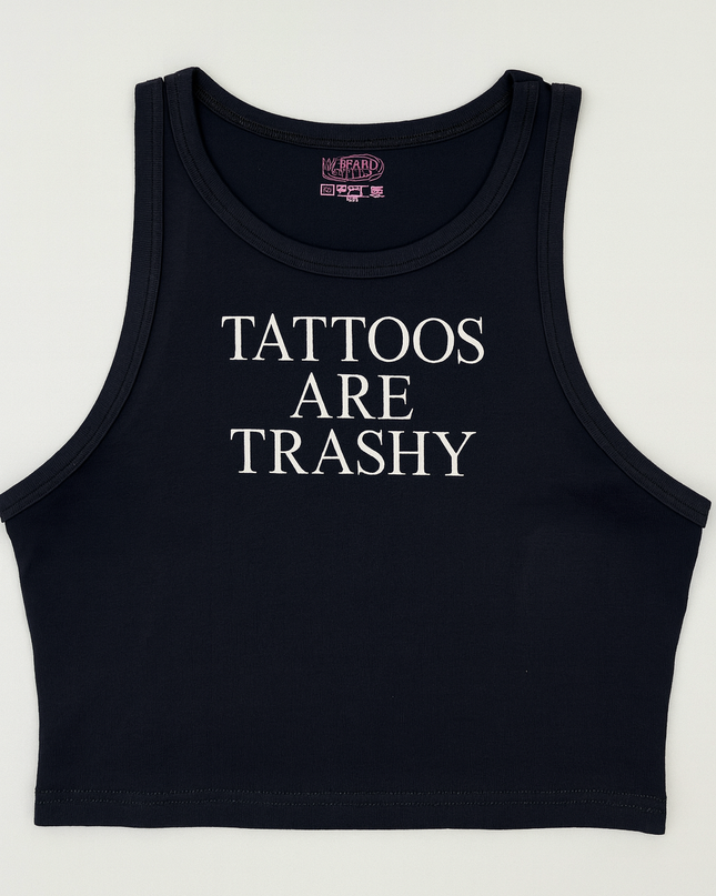 A black crop top with white text that reads "TATTOES ARE TRASHY".