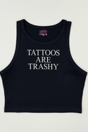 A black crop top with white text that reads "TATTOES ARE TRASHY".