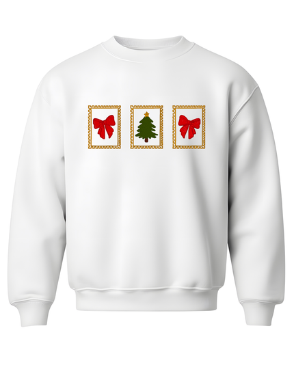A white sweater with three Christmas tree silhouettes and red bows on the left side.