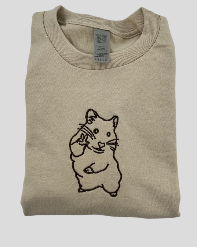 a t - shirt with a picture of a mouse on it