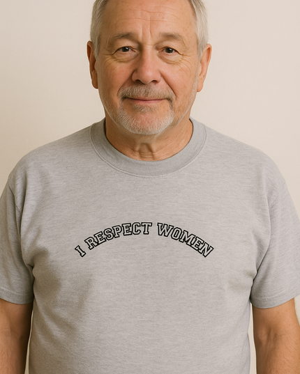 A man wearing a gray t-shirt with the text "I respect women" printed on it.