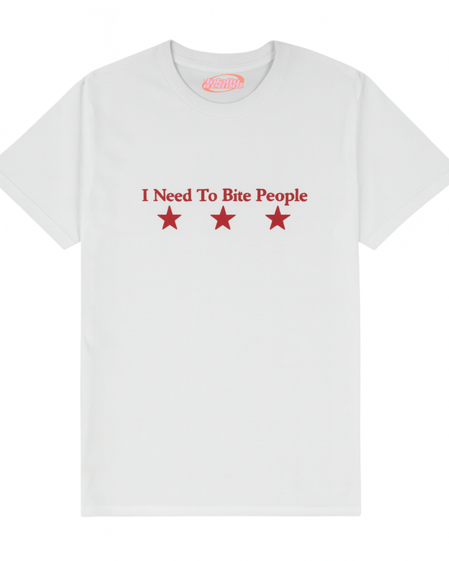 A white t-shirt with the text "I Need To Bite People" printed on it, along with three red stars.