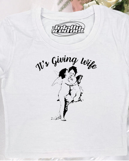 a white t - shirt with a picture of a woman hugging a man