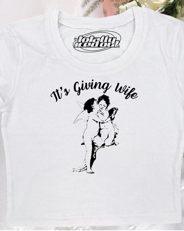 a white t - shirt with a picture of a woman hugging a man