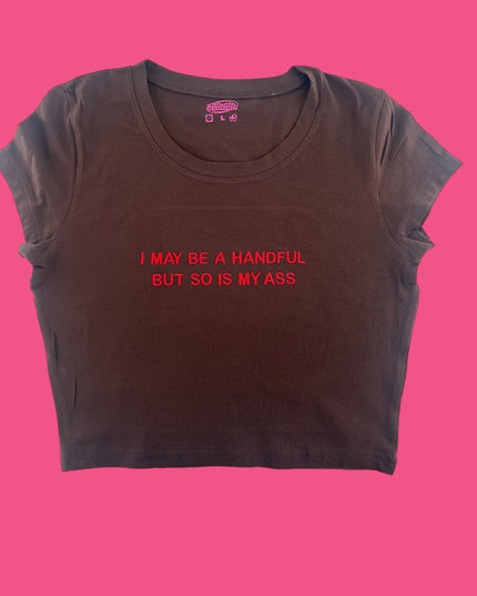 a t - shirt that says i may be a handful but so is my ass