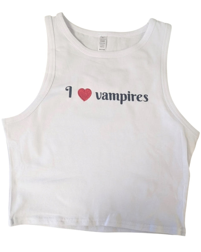 A white crop top with the text "I ♥ VAMPIRE" printed on it.