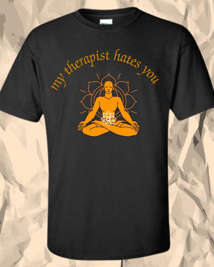 a black t - shirt with a buddha image on it