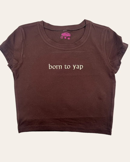a brown shirt that says born to yap