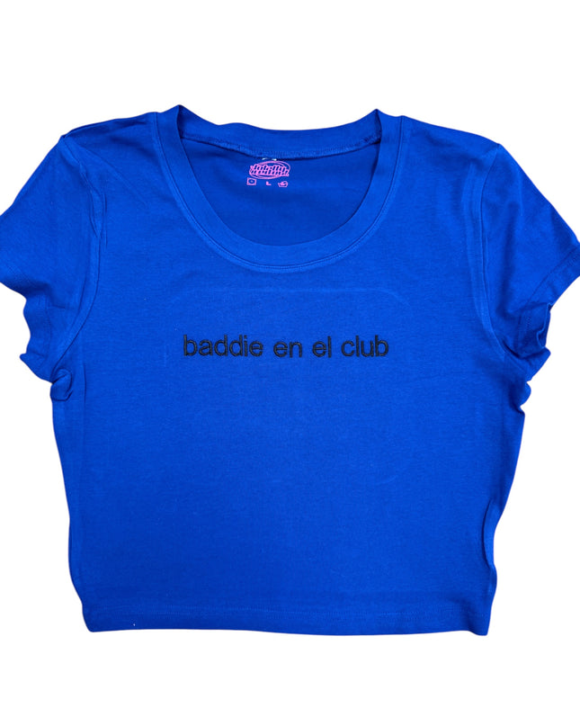 a blue shirt that says baddie en el club