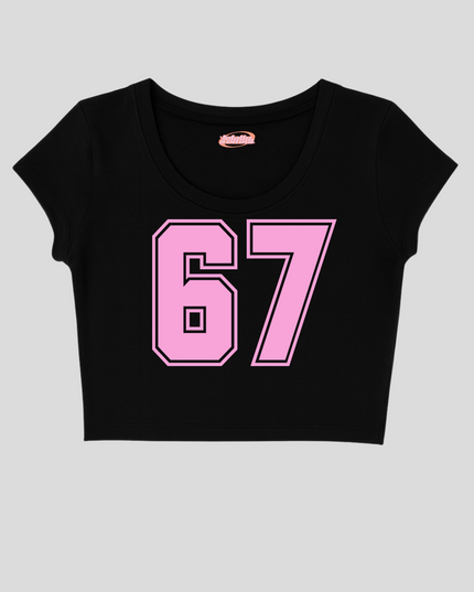 A black crop top with the number 67 printed in pink on the front.