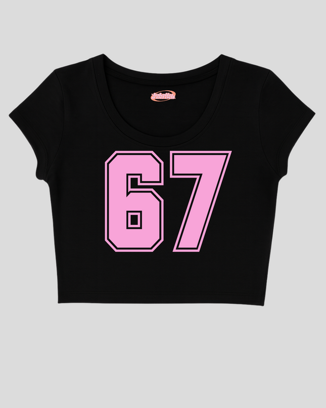 A black crop top with the number 67 printed in pink on the front.