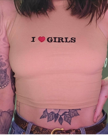 a woman with a tattoo on her stomach
