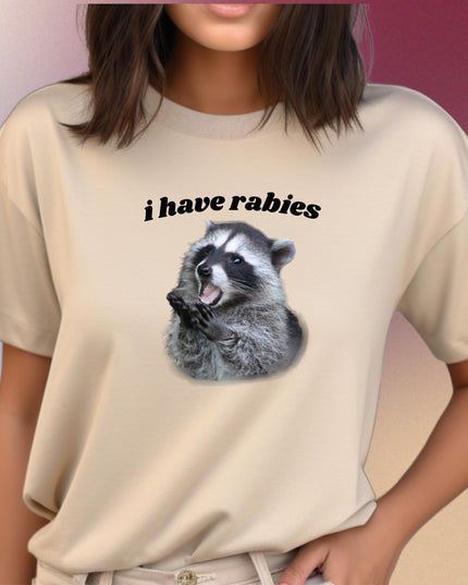a woman wearing a shirt with a raccoon on it
