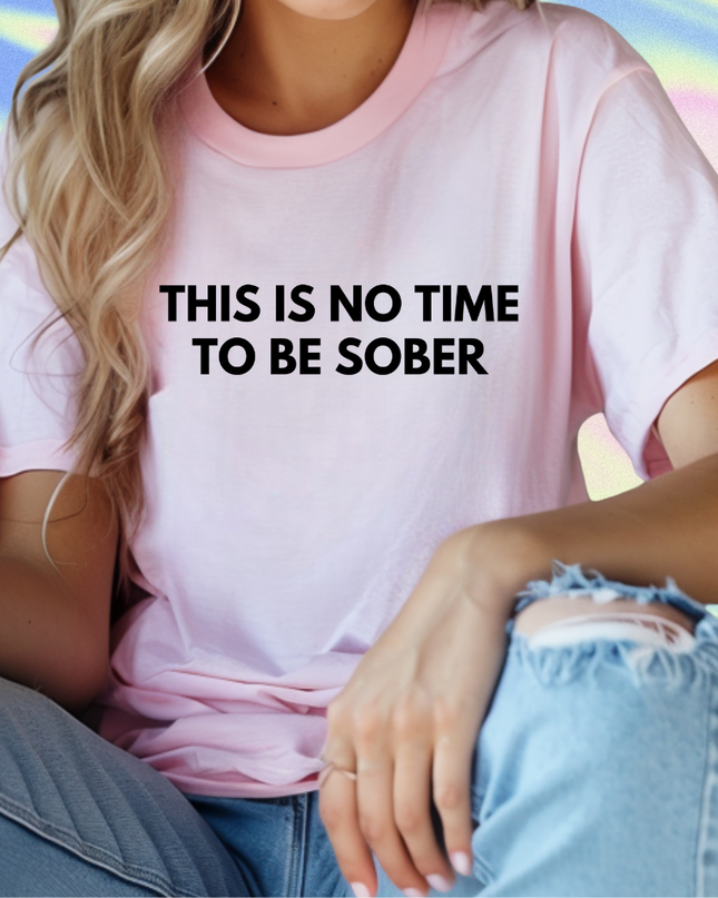 a woman wearing a pink t - shirt that says, this is no time to