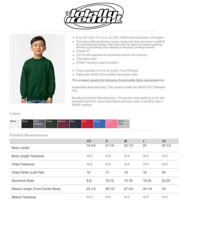 a young boy wearing a green sweater.