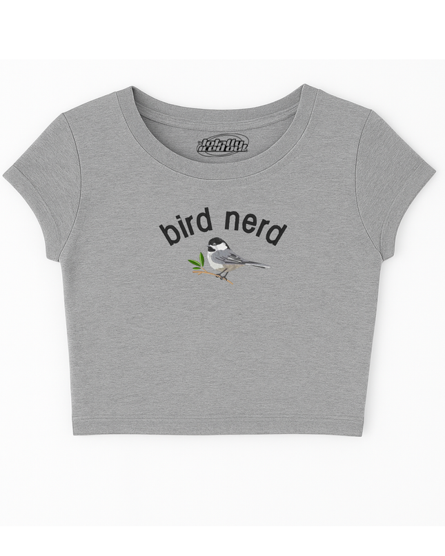 A gray crop top with a graphic of a bird and the text "bird nerd" printed on it.