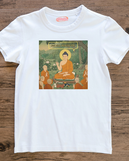 A white t-shirt with a printed image of a Buddhist monk and a group of people around him, along with the text "Just stop thinking lol" displayed above the image.